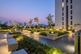 Beautiful podium garden with manicured landscaping and walking paths