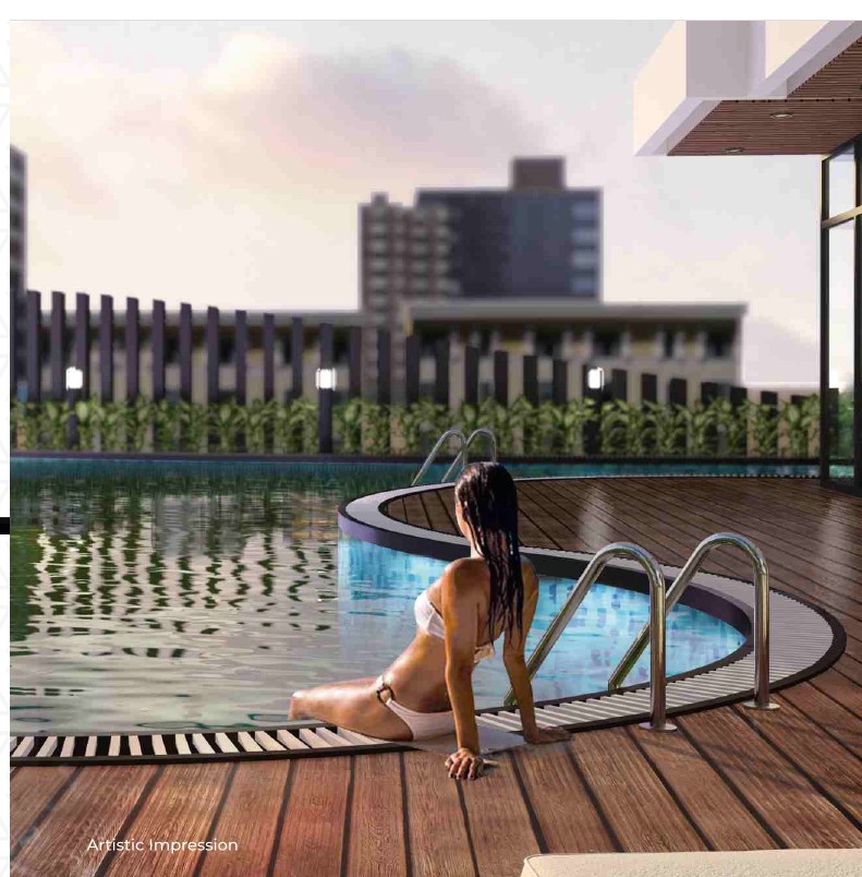 Luxury swimming pool with stunning skyline view and modern deck chairs